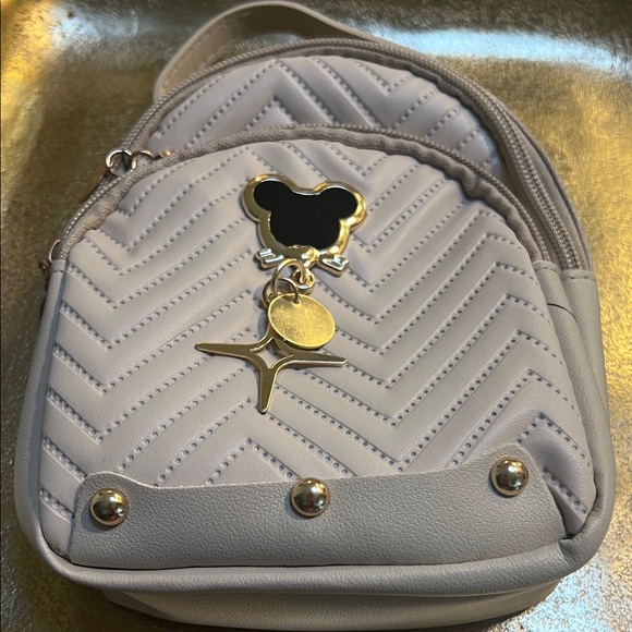 Micky Mouse’s Logo Handbags - #1345**Stylish Beige Mini Quilted Backpack “47 long” adjustable strap.